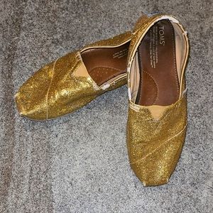 Glittery Gold Toms Flat Shoes